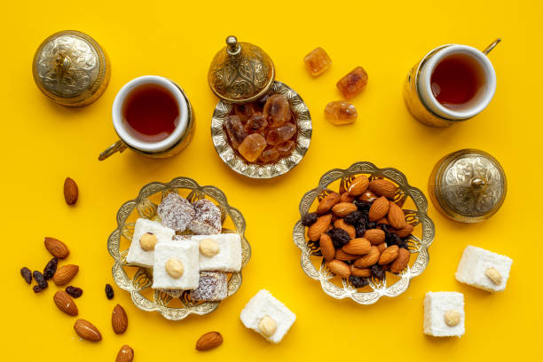 istock Muslim holiday with tea in traditional bronze cups with sweets 1703804250