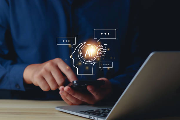 istock Businessman shows AI creation system, communication, innovation, ideas, questions, tools, chat, conversation, support, business development, information. 1703830859