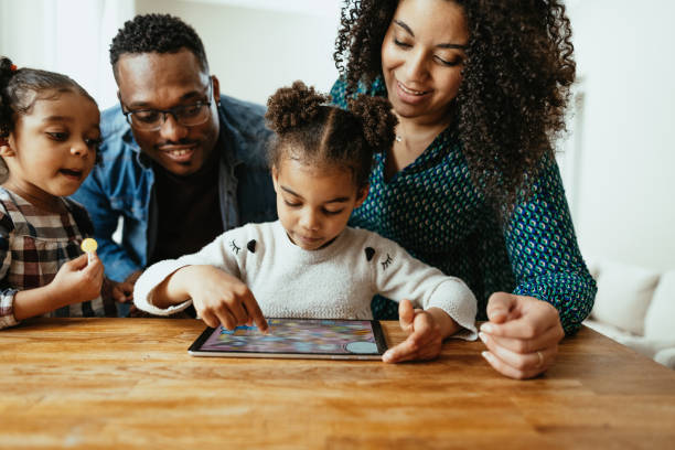 istock Multiracial family playing with kids 1703837348