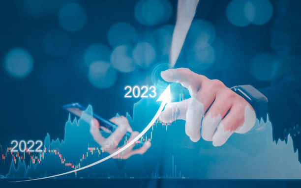 istock Businessman holding tablet with growing virtual hologram of statistics, graph and chart 1703859343