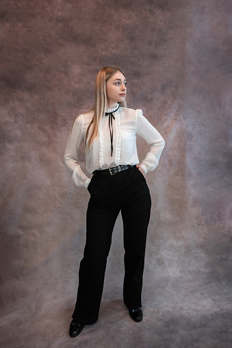 full-lenght portrait of a young business woman, studio shoot. Lifestyle