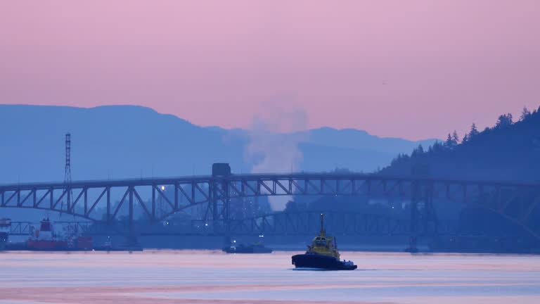 Tugboat Cruising in the Harbour on an Early Morning Static