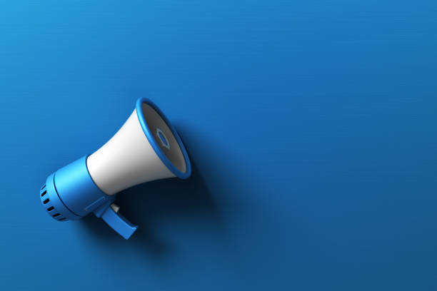 istock Blue Electric Megaphone on Blue Background Stock Photo 1703936576