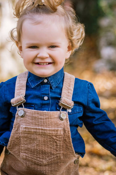 istock Positive toddler girl on blurred background 1703949608
