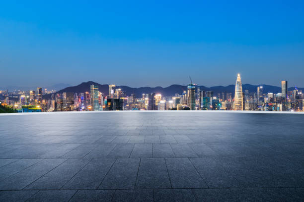 istock Empty floor and skyline in Shenzhen at night 1703984592