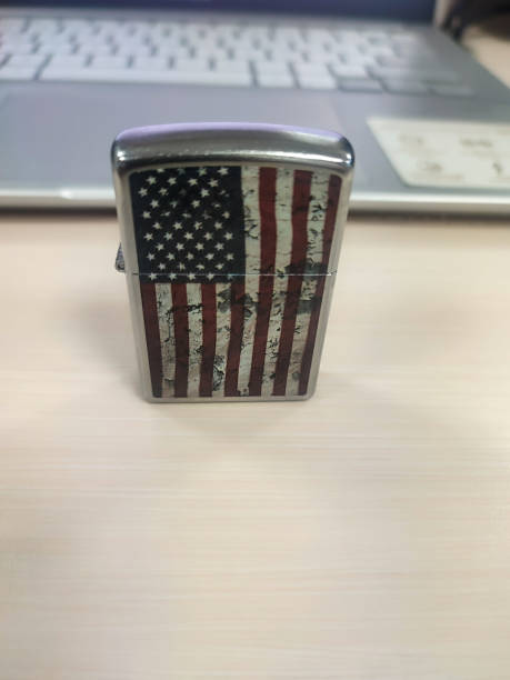 istock Vintage gas lighter with United States flag pattern 1703998791