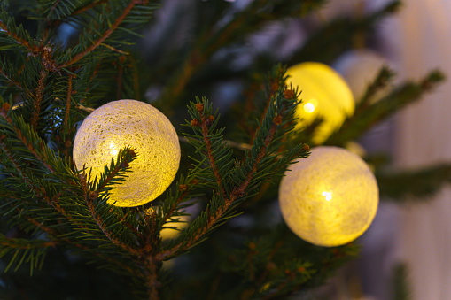 Christmas Baubles with snowflake glowing in red glowing sparkling background blurred