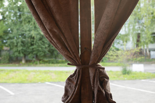 istock Curtains on summer veranda. Velvet curtains. Interior details. 1704055620