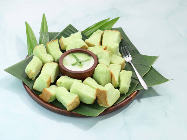 istock Sliced bread with custard and pandan sauce 1704110546