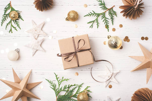 istock Festive Christmas background with gift box and Christmas decorations 1704121006