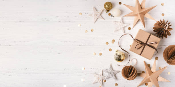 istock Festive Christmas background with gift box and Christmas decorations 1704121009