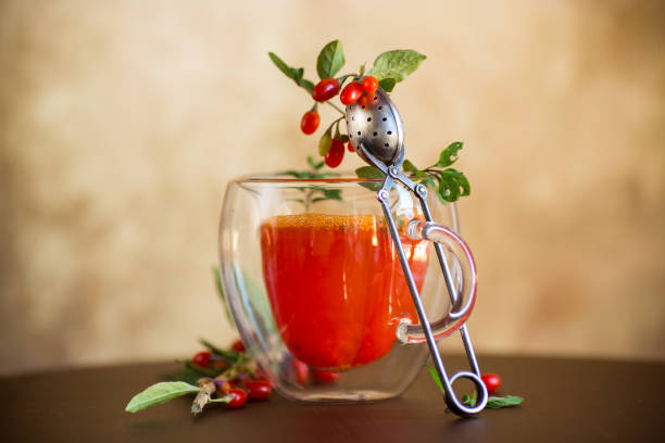 istock Prepared hot drink from ripe goji berries in a glass cup 1704138327