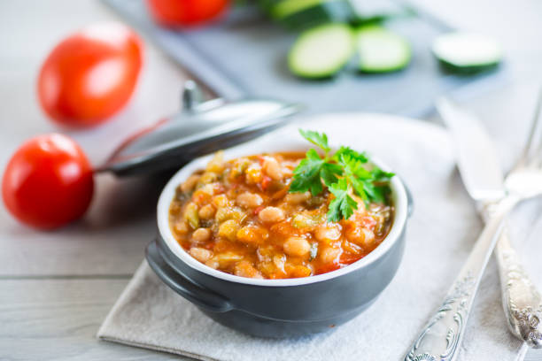 istock Cooked white beans with zucchini and other vegetables. 1704140655