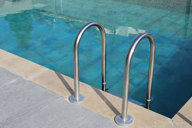 istock Handrails of pool stairs. 1704144992