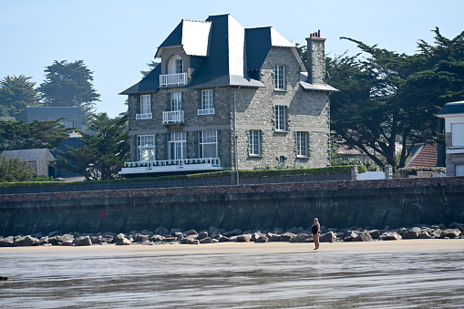 Erquy, France, September 3, 2023 - Caroual seafront promenade in Erquy in the Côtes-d'Armor department in Brittany, France.