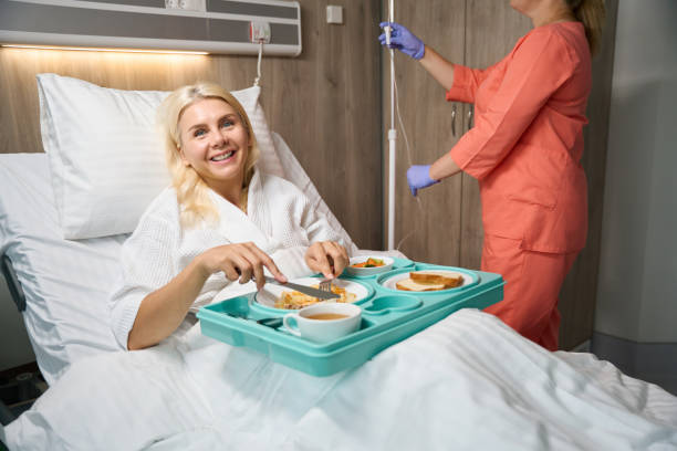 istock Recovering patient on bed rest is having lunch in bed 1704164536