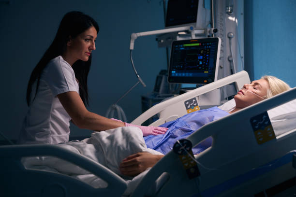 istock Female medic examines the patients abdomen 1704165185