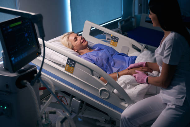 istock Woman in a medical uniform communicates with a patient 1704165210