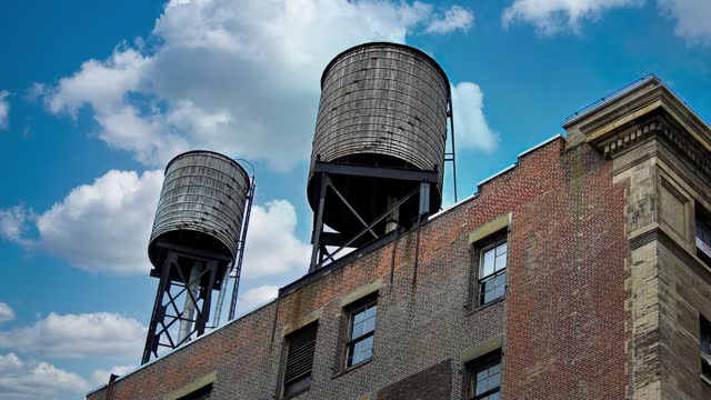 Water towers on the roof of a building Manhattan, NY.