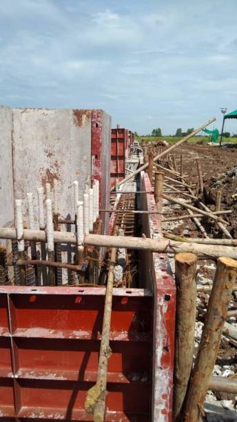 istock Concrete work pouring walls around the construction site 1704171526