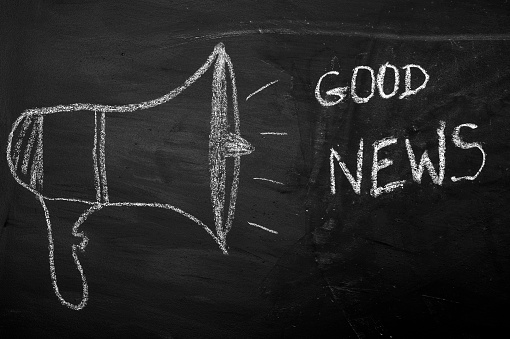 Good news concept on chalkboard