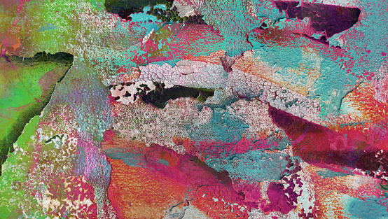 High Resolution old weathered bluish concrete wall detail, coated with multiple layers of beige, purple, red, black, gray, turquoise, magenta and emerald green paint colors nuances, applied through the years randomly one on top of the other, cracking and peeling off, run down by the elements, grunge background texture stock photo.