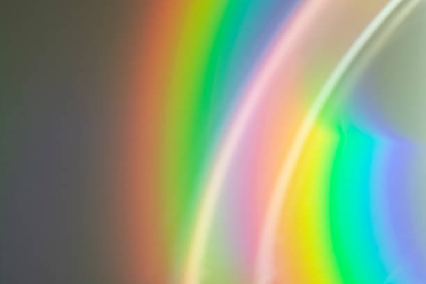 istock Blurred rainbow light refraction texture overlay effect for photos and mockups. 1704233181