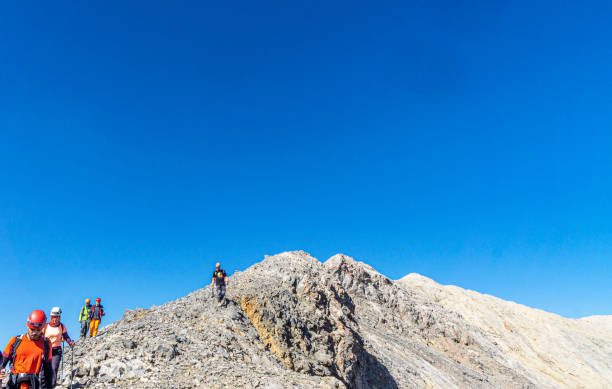 Medetsiz Tepe, Mersin, Turkey- September 24,2023: mountaineers are climbing the Medetsiz tepe (3524 m), which is the highest peak of Bolkar mountain, a part of Taurus mountains, Mersin, Türkiye