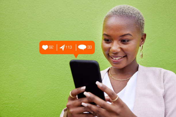 Woman, phone and texting with notification icon, typing or reading with web chat, blog and green background. African girl, contact and smartphone for communication, social network or overlay by wall