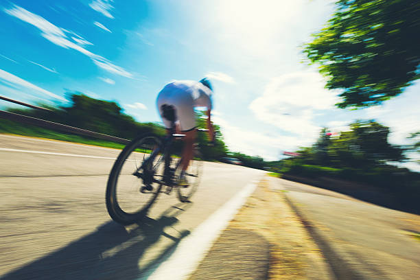 Cyclist in a Country Road