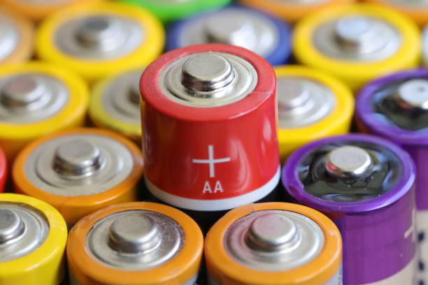 istock many round batteries and one red battery 1704293160