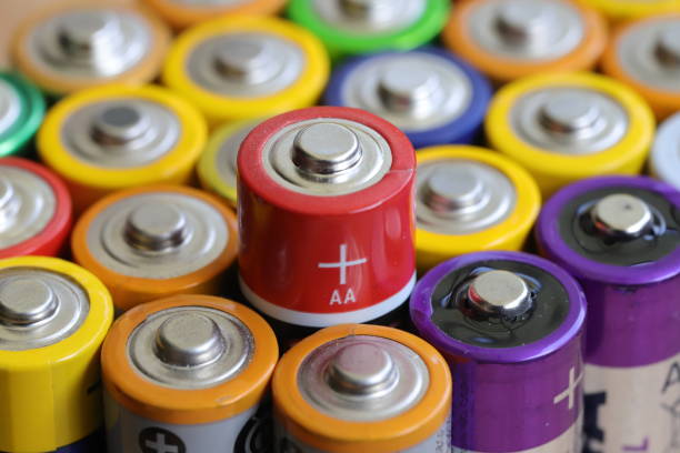 istock many round batteries and one red battery 1704293165