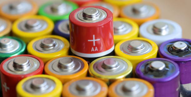 istock many round batteries and one red battery 1704293192