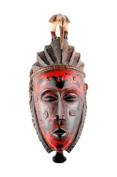 Photo of Red and brown traditional tribal mask From Mali