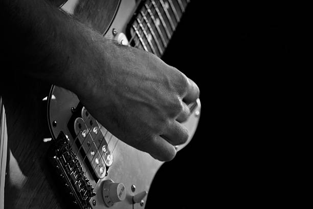 istock Close up on the hand of a guitarist 170429502