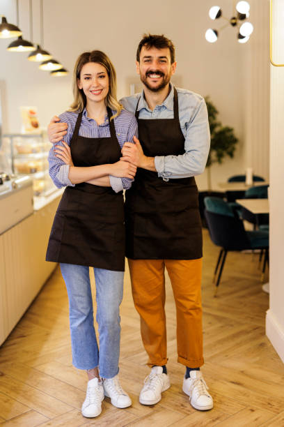istock Cheerful small business partners in restaurant 1704308664