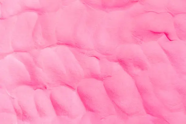pink clay texture background color plasticine.