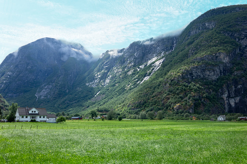 Beautiful view of mountains and meadow in Norway