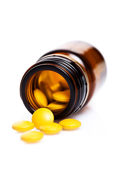 медицинский — таблетки - vitamin a vitamin b complex pill bottle medicine стоковые фото и изображения