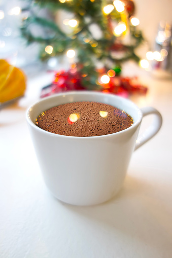 Hot chocolate with  Christmas tree and lights