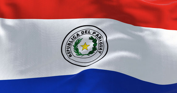 Close up of Paraguay flag waving. Three equal horizontal bands of red, white and blue with an emblem centered in the white band. 3d illustration render. Selective focus. Fluttering fabric. Patriotism
