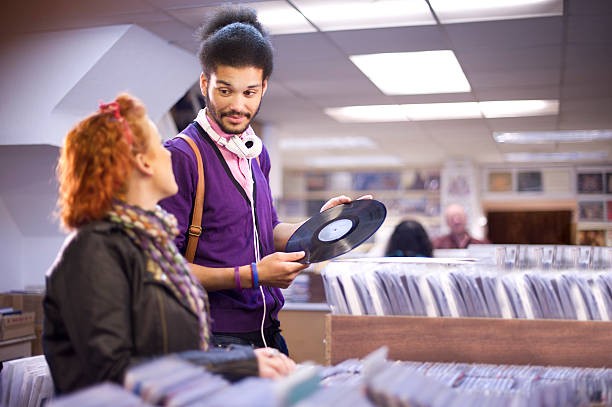 istock young couple in a record shop 170436625
