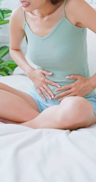 istock woman has stomach pain 1704391186