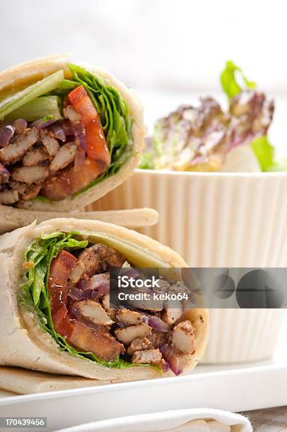 Kafka Shawarma Chicken Pita Wrap With A Small Side Salad Stock Photo - Download Image Now
