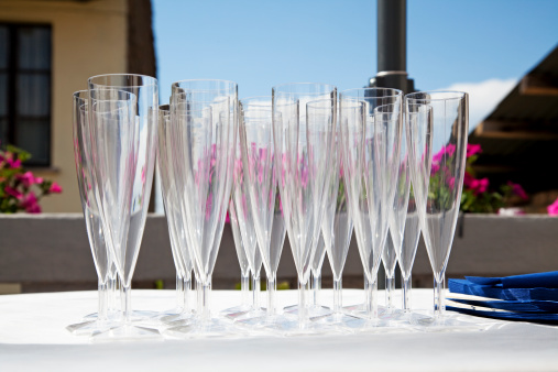 Empty glasses on a table in a terrace.