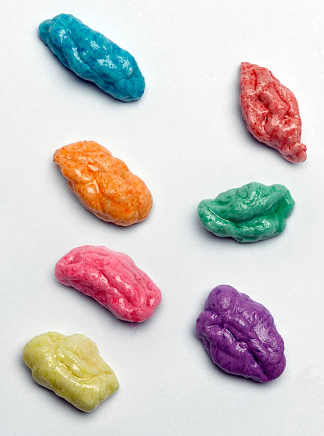 Chewed Bubblegum Seven different colors of chewed up gum chewed stock pictures, royalty-free photos & images