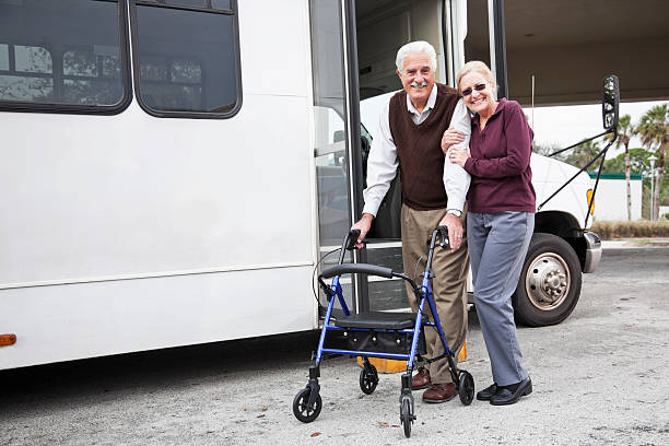 istock Senior couple outside shuttle bus 170440522