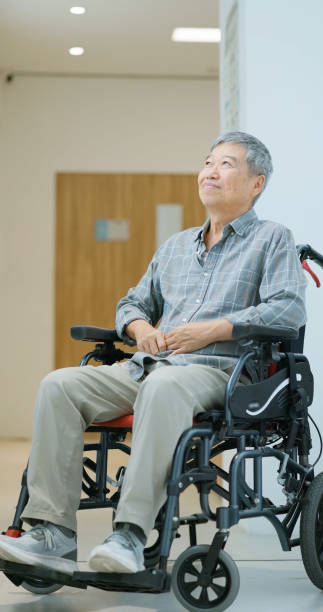 istock senior man sit in wheelchair 1704427018
