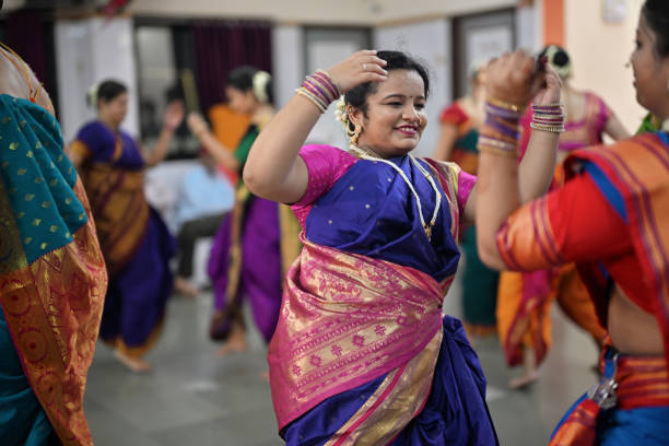 istock Women performing traditional Mangala Gaur Dance 1704453588