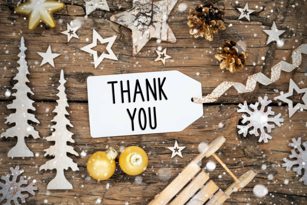istock Rustic Christmas Decor With Snowfall And Label With Text Thank You 1704463479